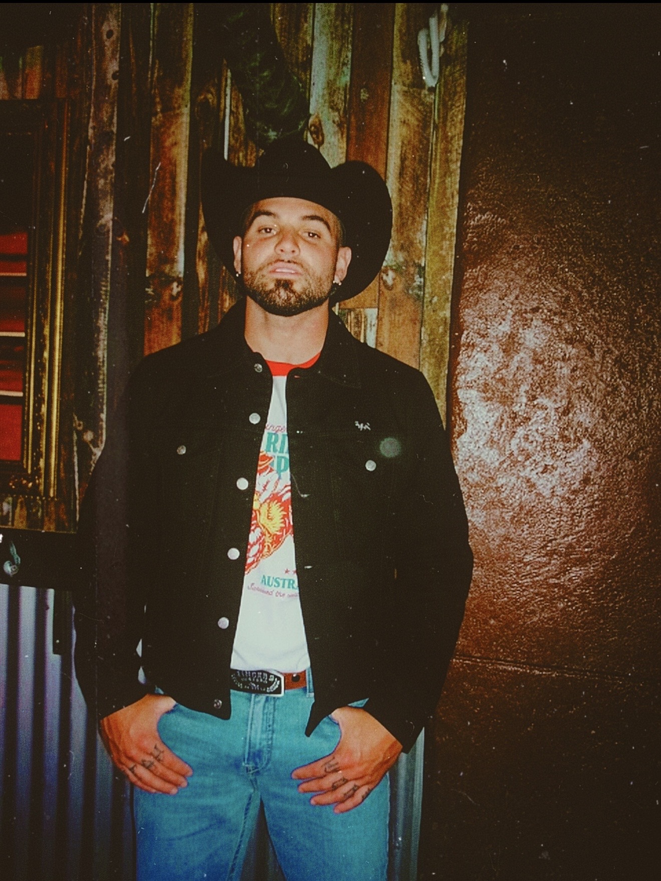 Emersxn in a cowboy hat and Ringers Western jacket